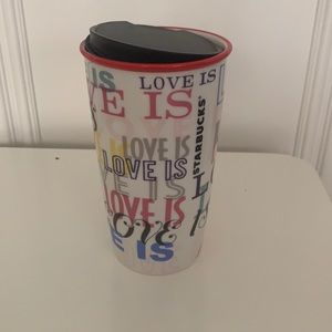 Never been used tall Starbucks coffe travel mug.